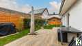 Foto Ihr perfektes neues Zuhause! Traumhaftes EFH mit ELW, Terrasse, Garten, EBK und PV-Anlage