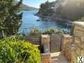 Foto Moderne Villa am Wasser mit Pool zum Verkauf auf der Insel Korcula in Kroatien