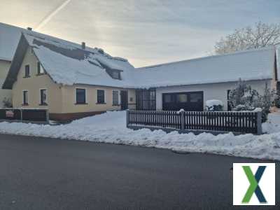 Foto Einfamilienhaus mit Wintergarten und Garage