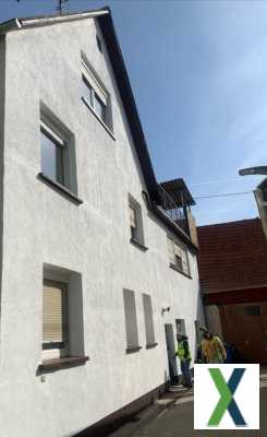Foto Verkaufe großes Haus mit 9 ZKBB + Terrasse + Keller in Monsheim