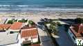 Foto Strandhaus direkt am Strand von Els Poblets mit 2 Schlafzimmern mit unschlagbarem Blick auf das Meer.