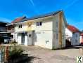 Foto Freistehendes Niedrigenergiehaus mit großer Terrasse und traumhaftem Außenbereich