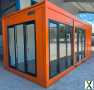 Foto  2 Jahre Garantie - Schlüsselfertig & direkt einsatzbereit  Bürocontainer neu kaufen - Containerbüro - Container in Orange - Baucontainer Baustellenbüro Baustellencontainer Europa Lieferung + Kran