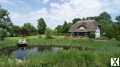 Foto RÜGEN Reet gedecktes Haus mit Teich auf großem Grundstück zu verkaufen