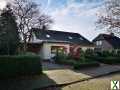 Foto Dachgeschosswohnung im Zweifamilienhaus mit Carport und Garten