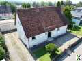 Foto Einfamilienhaus mit Garten und Carport