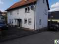 Foto Freistehendes Einfamilienhaus mit Grundstück und Carport in Suess