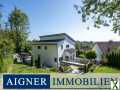 Foto AIGNER - Einfamilienhaus mit Einliegerwohnung und traumhaftem Alpenpanorama in Wartenberg