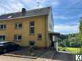 Foto Einseitig angebautes Einfamilienhaus mit schönem Garten in idyllischer Lage von Schwalbach