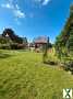 Foto Einfamilienhaus mit großen Garten in Top-Lage