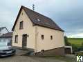 Foto Freistehendes Einfamilienhaus mit Panoramablick Garten, Garagen am Ortsrand in ruhiger Höhenlage