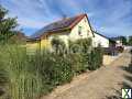 Foto Charmantes Einfamilienhaus mit großzügigem Garten und Wintergarten