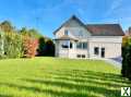 Foto Modernisiertes Einfamilienhaus mit großem Garten