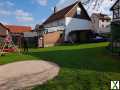 Foto Freistehendes Einfamilienhaus mit Grundstück und Carport in Sueß