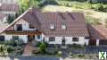 Foto Großes Wohnhaus mit mehreren Garagen und riesigem Grundstück in Löschenrod