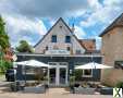 Foto Zweifamilienhaus mit gut laufender Pizzeria
