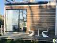 Foto Tiny House mit elektrisch fahrbaren Zimmern, Dachterrasse