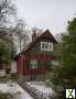 Foto Wunderschönes historisches Holzhaus mit großem Garten