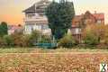 Foto Mehrfamilienhaus in Spitzenlage mit freiem Blick ins Grüne.