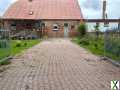 Foto Einseitig angebautes Einfamilienhaus mit Teilkeller in Toddin OT Gramnitz Hof