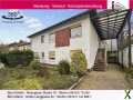Foto Freistehender Bungalow mit Einliegerwohnung auf traumhaften, weiter bebaubaren Grundstück in guter Lage