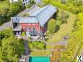 Foto **Traumhaftes, exklusives Wohnhaus mit Naturschwimmteich in Prüm in der Eifel**