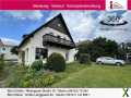 Foto Charmantes Einfamilienhaus mit Terrasse und Garten