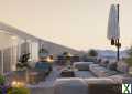 Foto Neubau: Exklusive Penthouse-Wohnung mit Bergblick