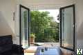 Foto Helle 3-Zimmer-Wohnung mit Balkon, Loggia und Gartenblick