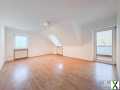 Foto Helle 3-Zimmer-Dachgeschosswohnung mit Loggia und Bergblick