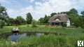 Foto RÜGEN: Reet gedecktes Haus mit Teich auf großem Grundstück zu verkaufen