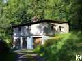Foto Kleines Haus mit Garten