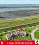 Foto Direkt hinter dem Naturerbe Wattenmeer  landschaftstypisches Reihenmittelhaus unter Reet!