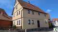 Foto Freistehendes Einfamilienhaus mit Nebengebäude