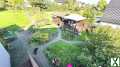 Foto Herrlicher Garten! Große Eigentumswohnung mit 6 Zimmer, 2 Garagen, Garten und Kachelofen