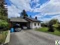 Foto Einfamilienhaus mit Carport
