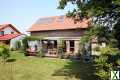 Foto Freistehendes Einfamilienhaus mit Carport