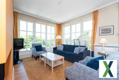 Foto Die Residenz 4.1- Strandglück im Paket: Seeblick, Sauna, Hotelluxus und Rendite inbegriffen!