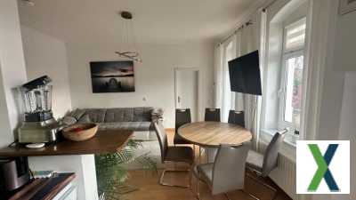 Foto moderne 3-Zimmer-Wohnung mit Balkon, EBK und Garage