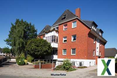 Foto Freistehendes Mehrfamilienhaus mit 3 Wohnungen, Carport und Garage