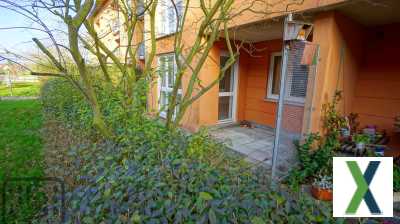 Foto Bezugsfreies Apartment mit eigenem Garten und TG-Stellplatz in idyllischer Wohnlage