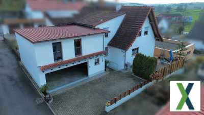 Foto Haus mit Geschäft/Showroom