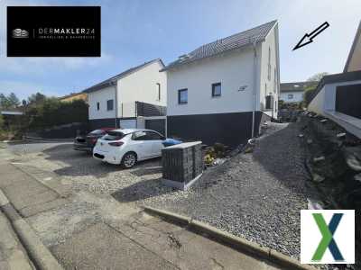 Foto Charmantes Einfamilienhaus mit hochwertiger EBK und Garage zu verkaufen