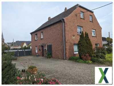 Foto Einfamilienhaus mit Einliegerwohnung auf großem Grundstück in Xanten-Marienbaum