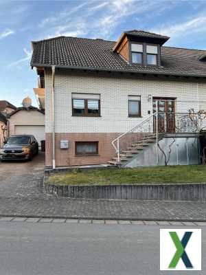 Foto Doppelhaushälfte mit Garten